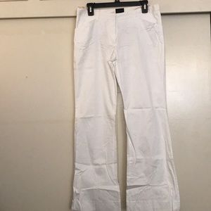 The limited white boot leg pants size 8